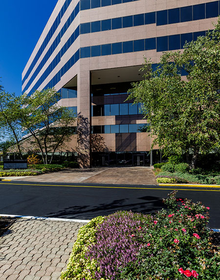 The entrance to the Meridian Mark II office building in Carmel, IN, and managed by Zeller.